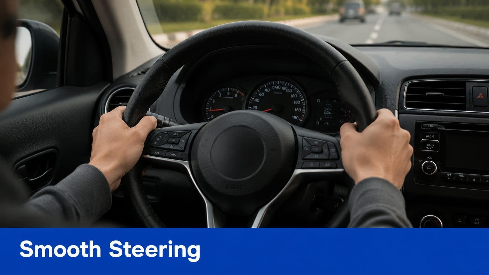 A person holding the steering wheel while driving a car on a road in Ontario.